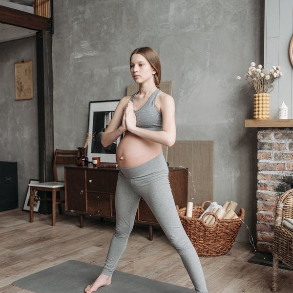 Person in a balanced pose, showing physical and mental harmony.